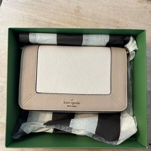 Kate Spade Tan and White Clutch with Sophisticated Design